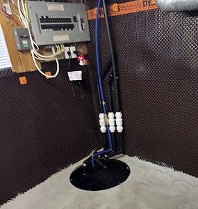 Interior waterproofing and sump pump work in a Mississauga basement